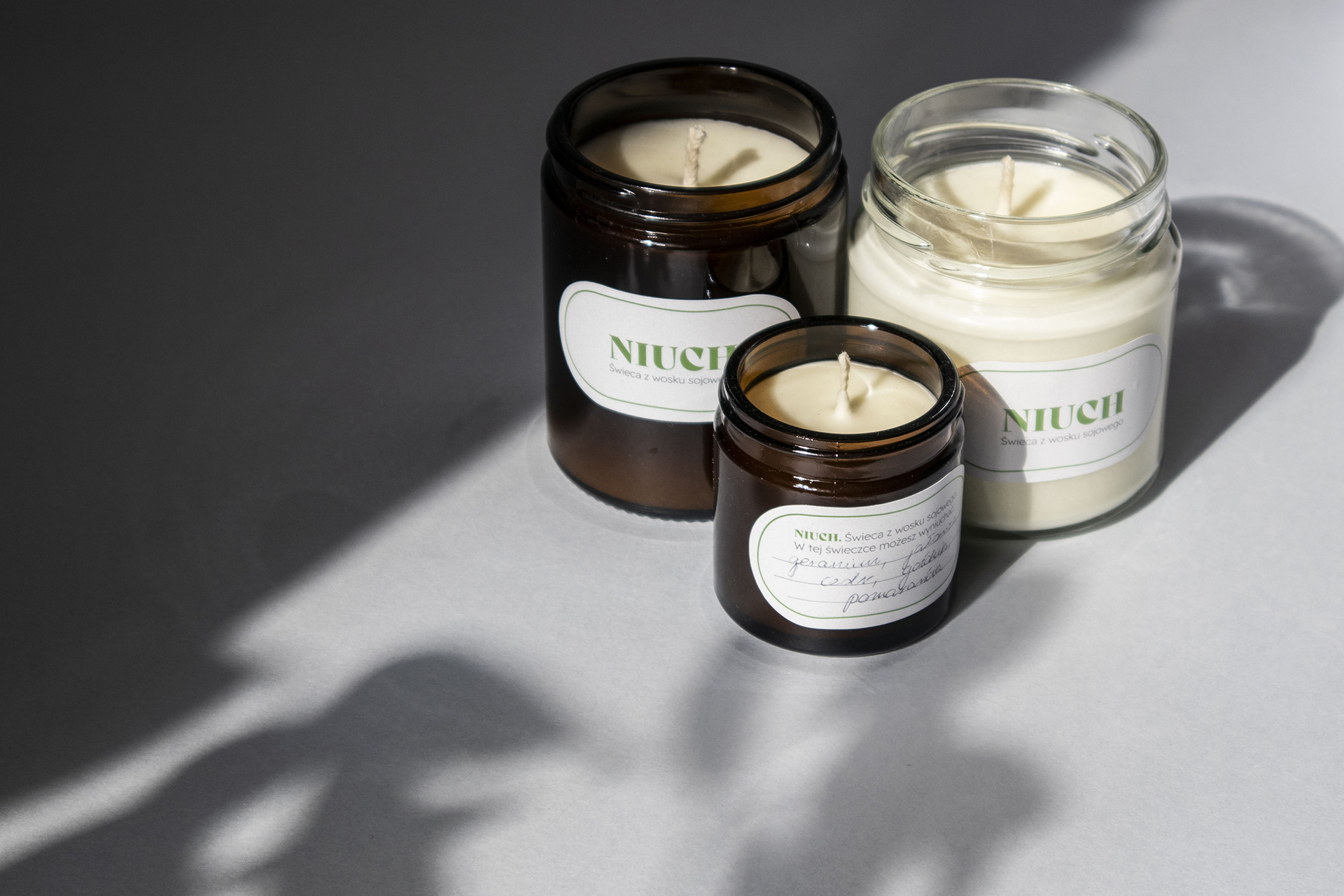 Picture of Niuch project. Branding for soy candles in glass jars.